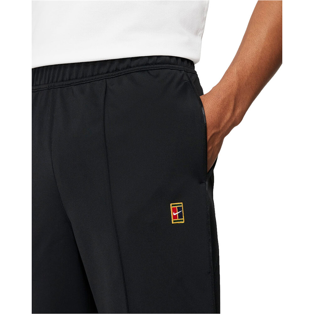 Nike pantalón tenis hombre M NKCT HERITAGE SUIT PANT 03