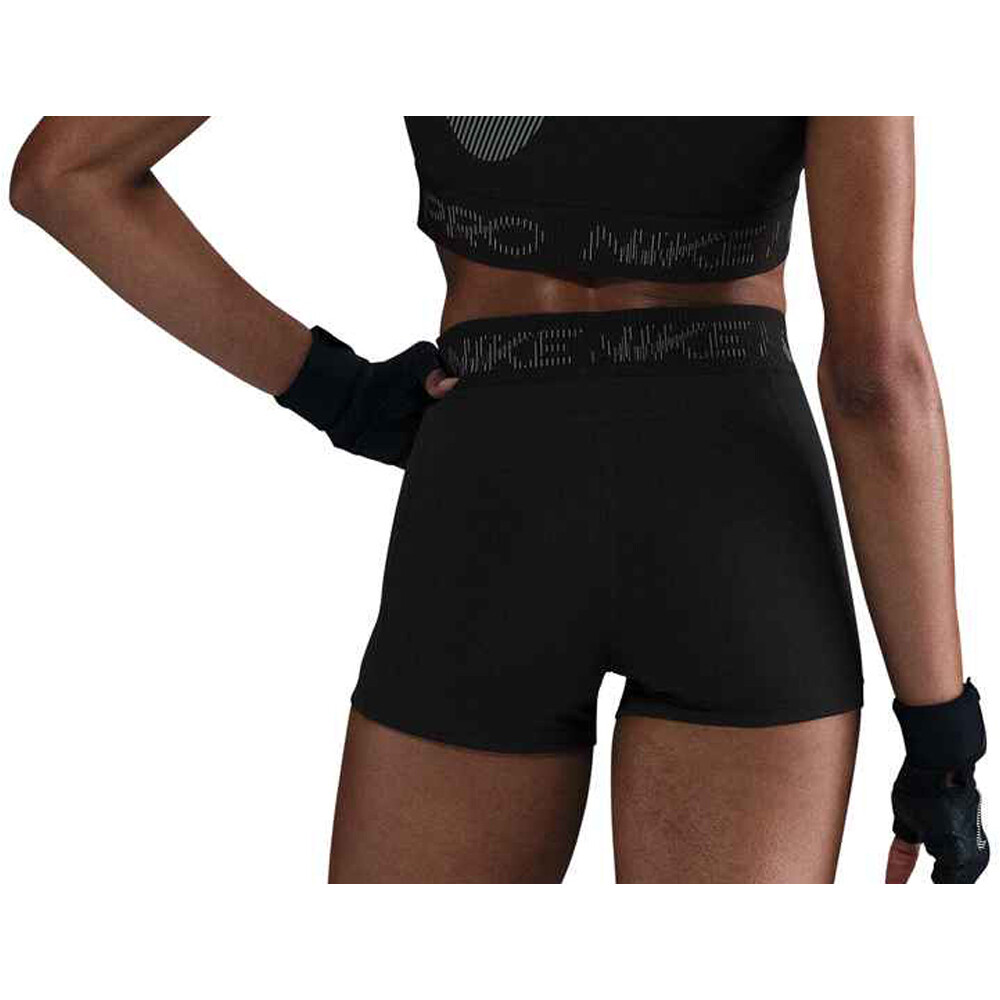 Nike pantalones y mallas cortas fitness mujer W NP DF MR 3IN SHORT TT GRX vista trasera