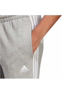 adidas pantalón mujer Essentials 3 bandas French Terry Cuffed vista trasera